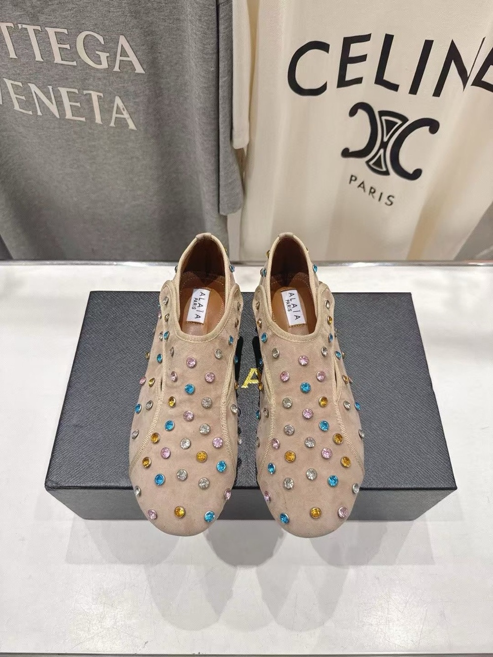 ALAIA Beige Embellished Slip-On Sneakers with Multicolor Studs